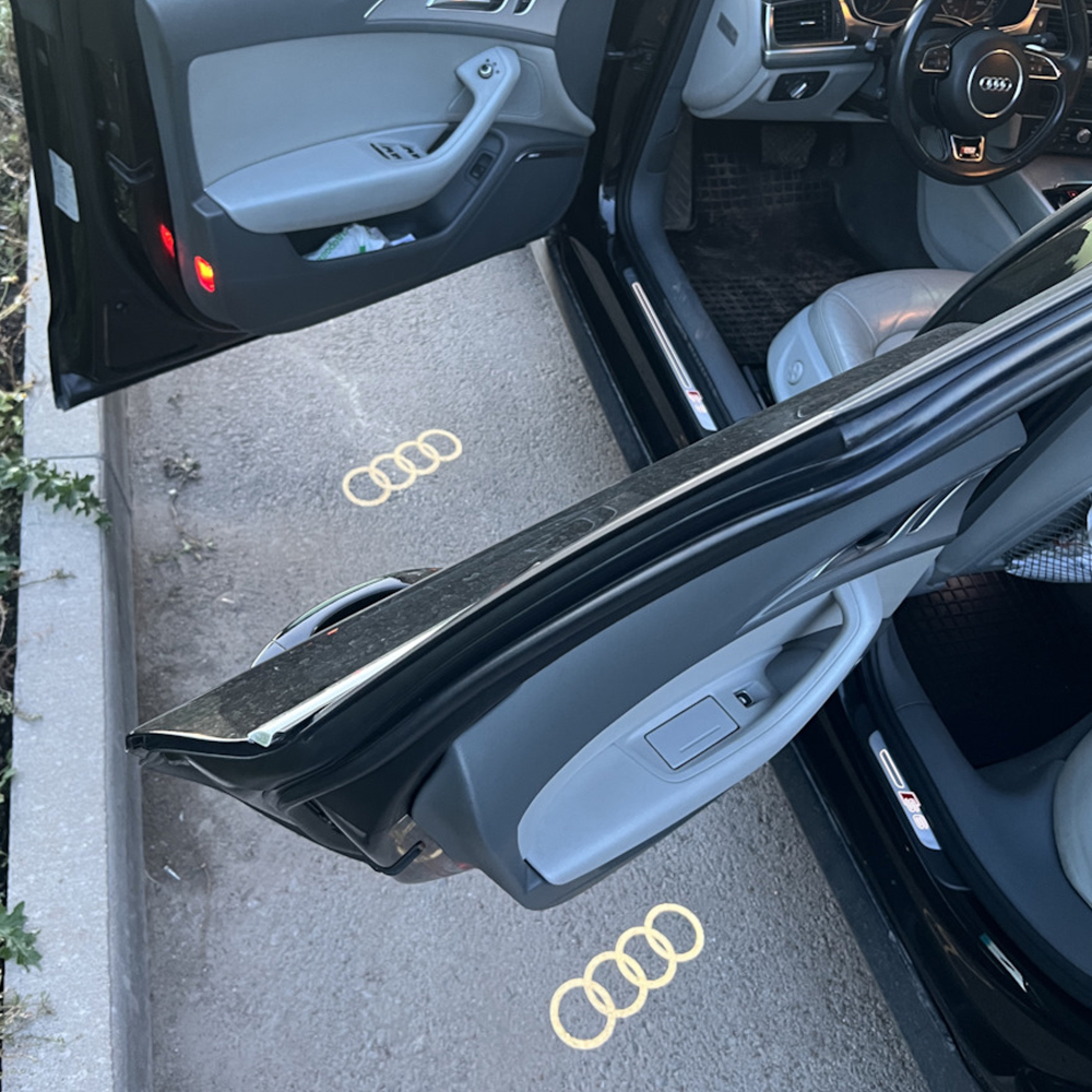 КОМПЛЕКТ LED проекция подсветка логотипа дверей Audi A1 A3 A4 A5 A6 A7 A8 B7 A6 R8 Q3 Q5 Q7 RS ( оригинальный стиль )