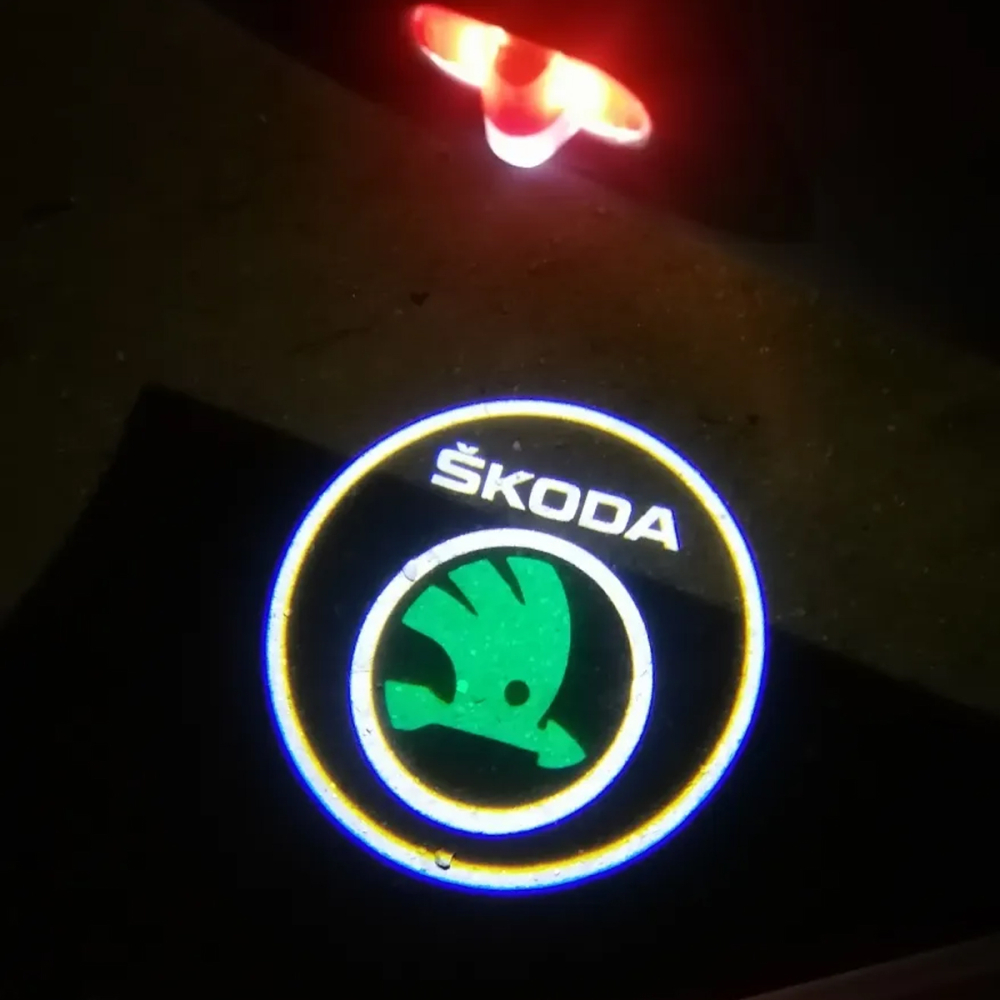 LED проекция подсветка логотипа для дверей Skoda Octavia Tour A4, A5 (ЗЕЛЕНЫЕ) LED проекция подсветка логотипа для дверей Skoda Octavia Tour A4, A5 (ЗЕЛЕНЫЕ)
