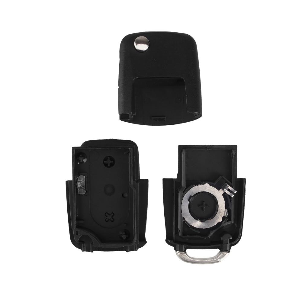 Выкидной корпус ключа на 2 кнопки Volkswagen Passat B5 , Passat B6 , Tiguan , Golf 4 , Golf 5 , New Beetle , Polo , Skoda Fabia , Superb , Roomster , Octavia Tour , Octavia A5 ( с местом под батарейку , лезвие HU66 , лампочка посредине ) 